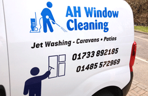 vinyl cut out and adhered to the side of a van